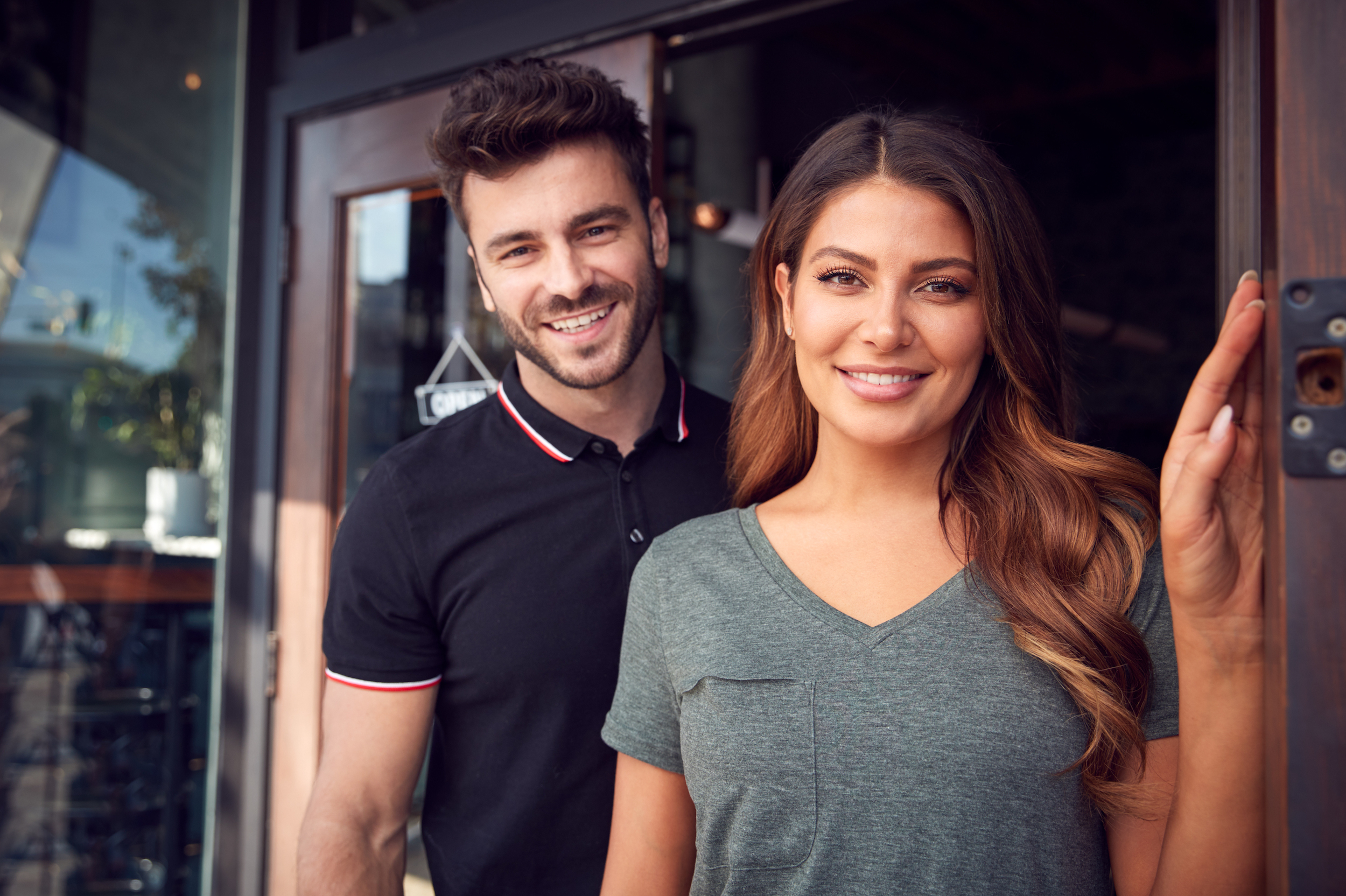 portrait of couple starting new coffee shop or res 277DNFP